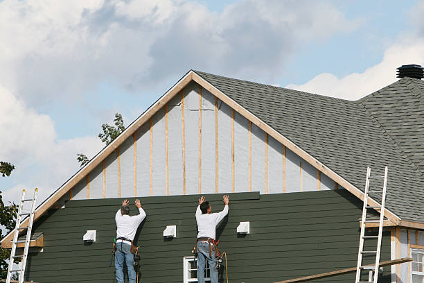 Professional Siding Installation technician working in Worton, MD